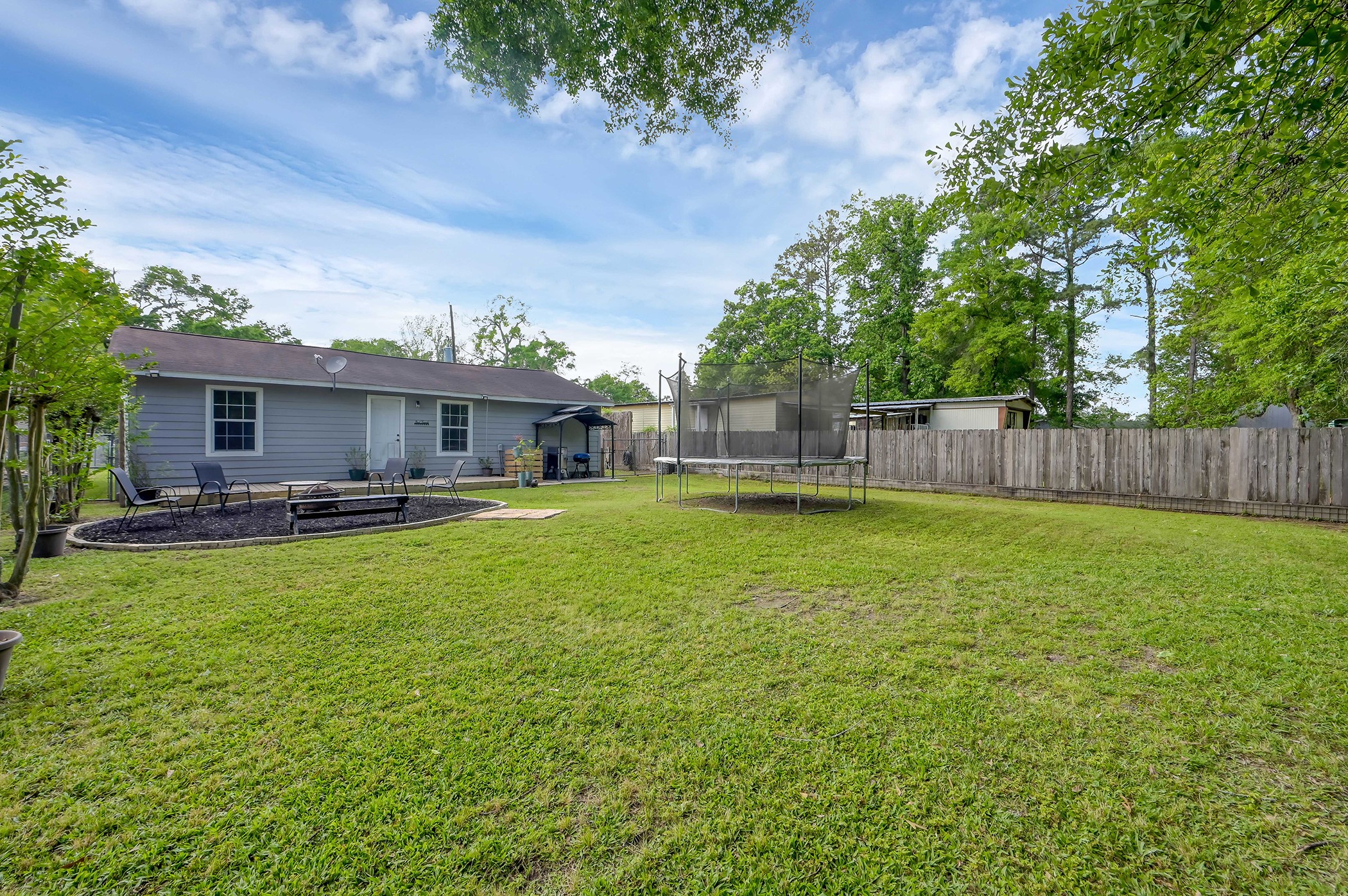 24193 Parker Road Porter, TX 77365 - Photo 15 of 15 a view of a house with a backyard