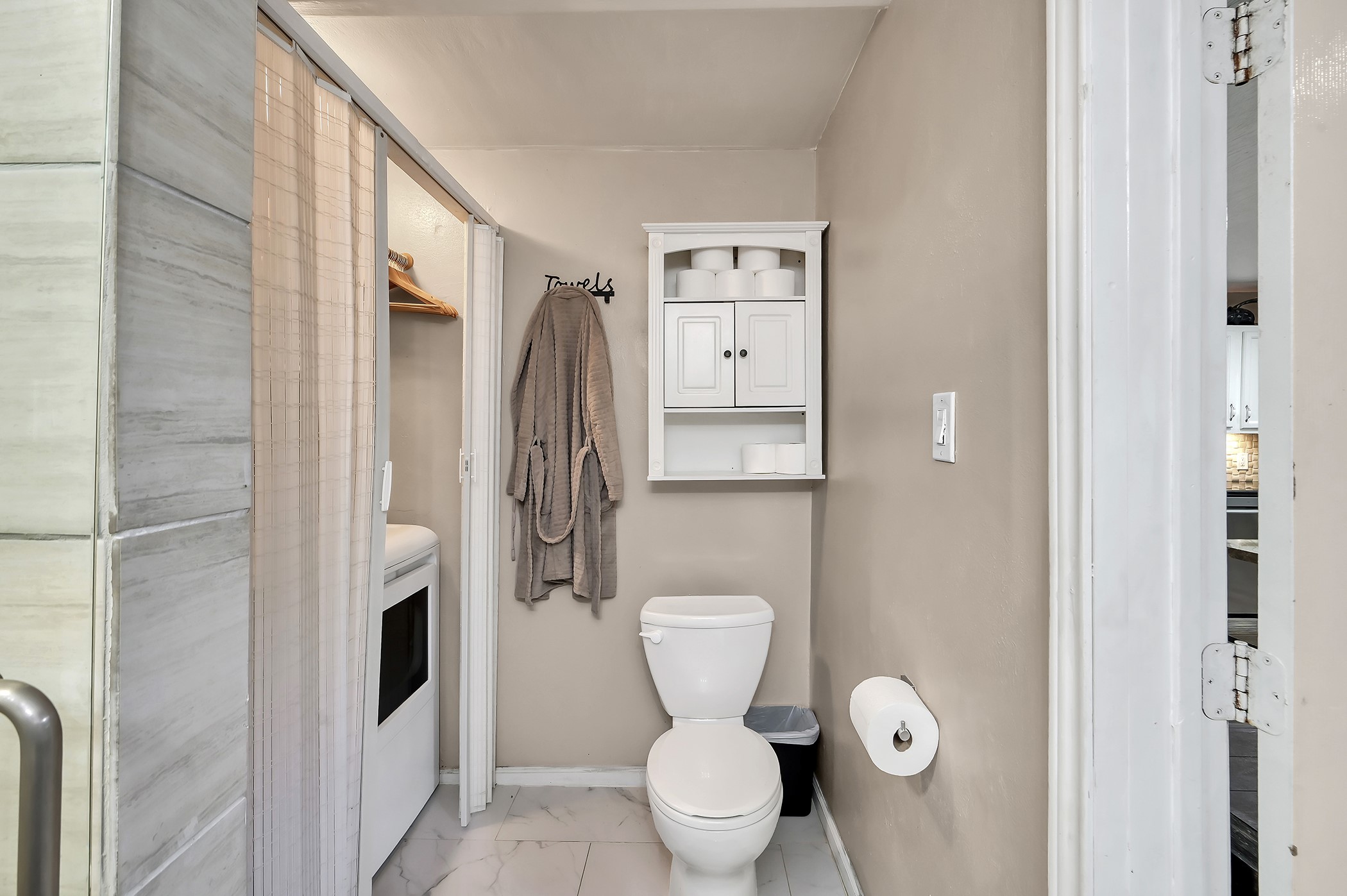 24193 Parker Road Porter, TX 77365 - Photo 8 of 15 a bathroom with a toilet and a shower