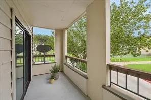 a view of a room with a large window