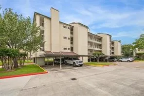 a view of a building with a swimming pool