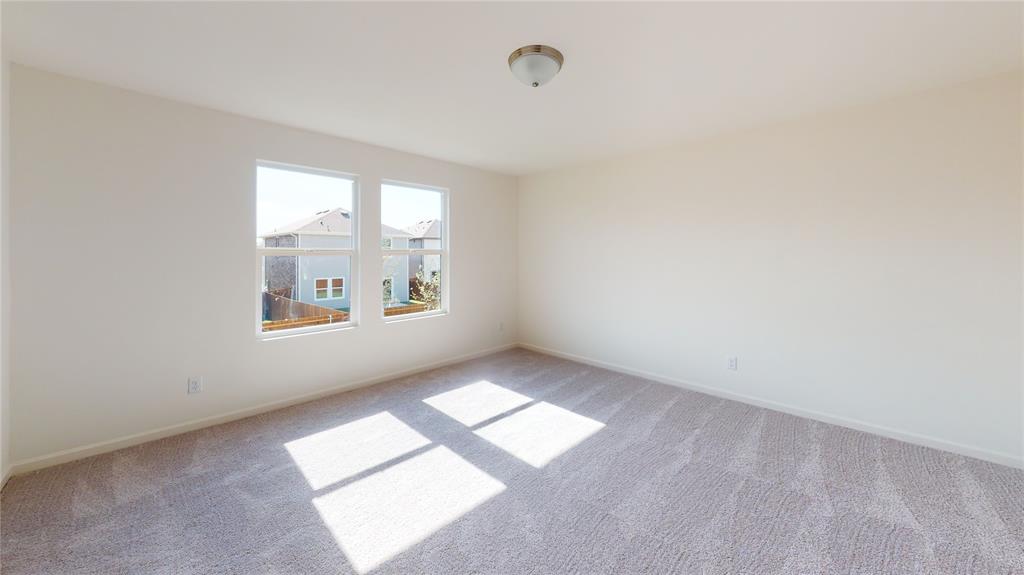 1706 Washington Street Princeton, TX 75407 - Photo 13 of 19 an empty room with windows