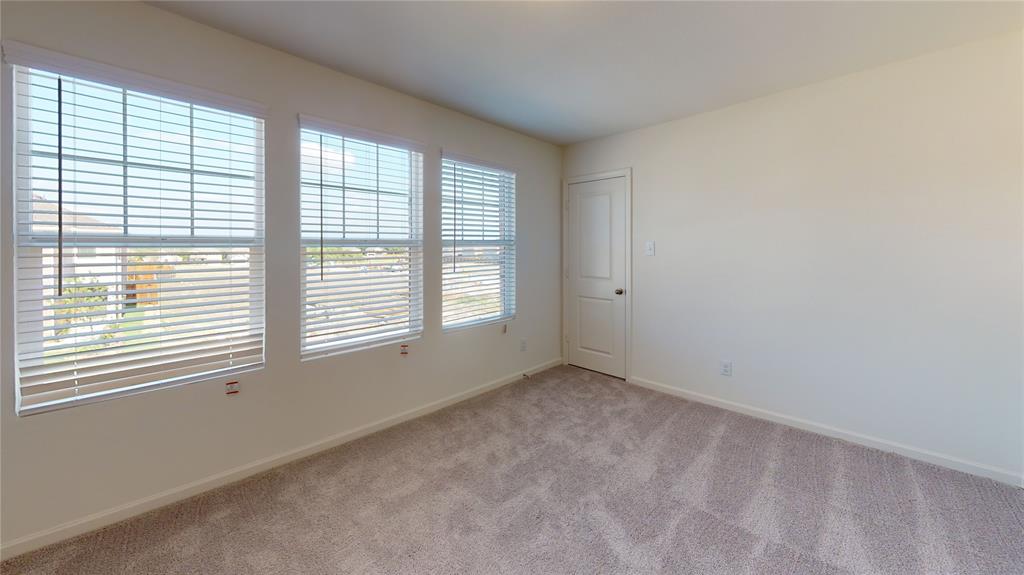 1706 Washington Street Princeton, TX 75407 - Photo 15 of 19 a view of an empty room with a window