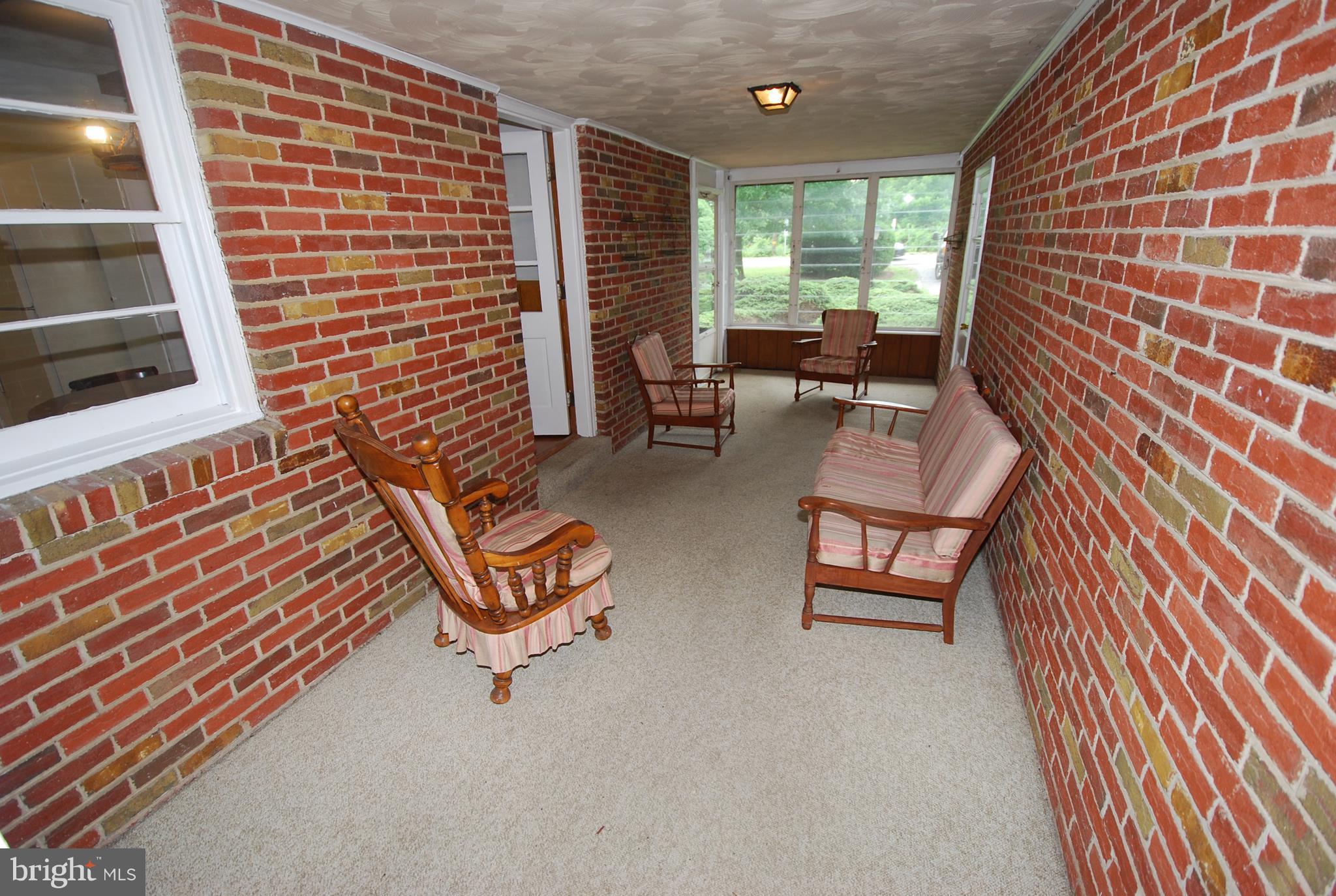 27315 Ridge Road Damascus, MD 20872 - Photo 12 of 28 breezeway between garage and house