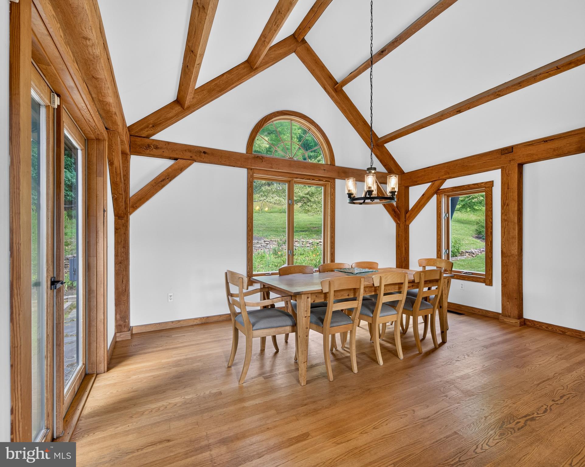 4028 South F T Valley Road Etlan, VA 22719 - Photo 30 of 101 a view of a dining room with furniture window and wooden floor