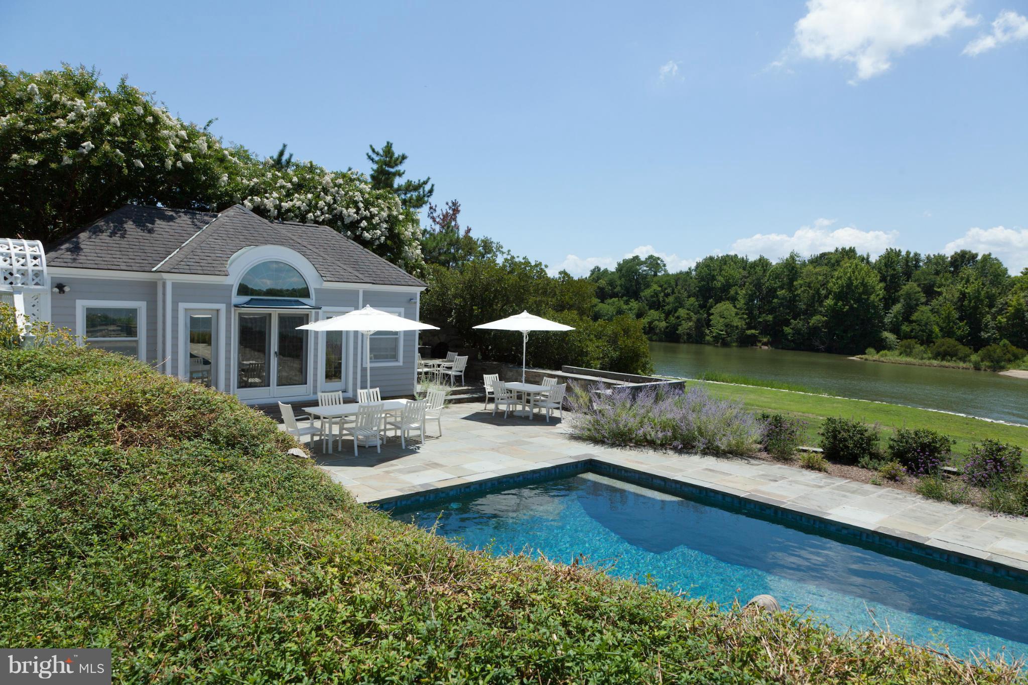 1234 Cherry Tree Lane Annapolis, MD 21403 - Photo 21 of 29 a view of a house with pool garden and sitting area