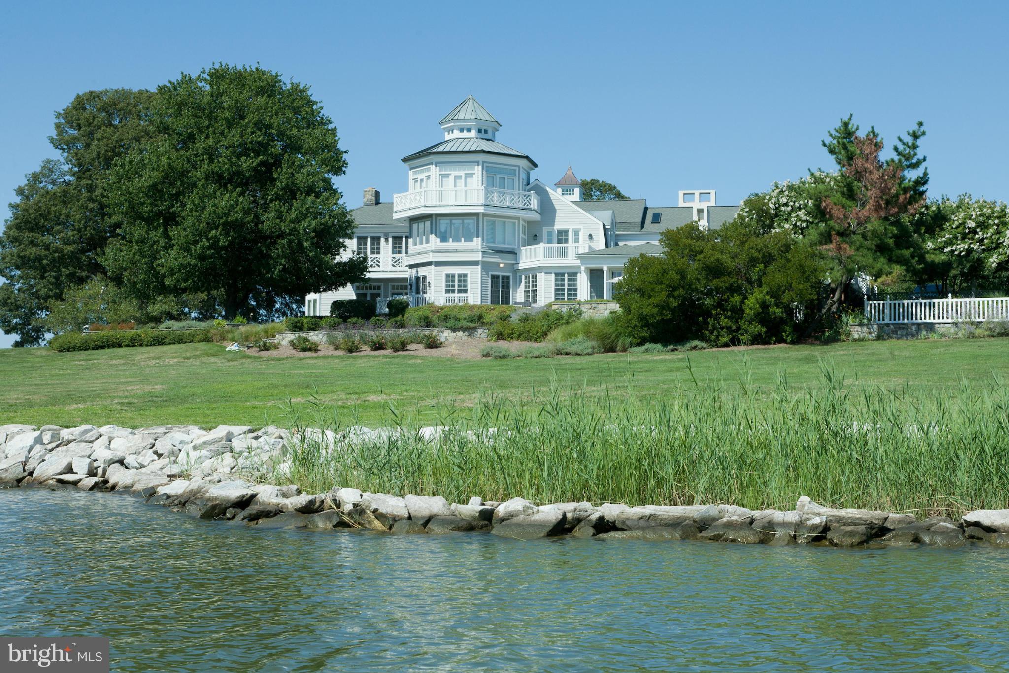 1234 Cherry Tree Lane Annapolis, MD 21403 - Photo 23 of 29 a view of a lake with a building in the background