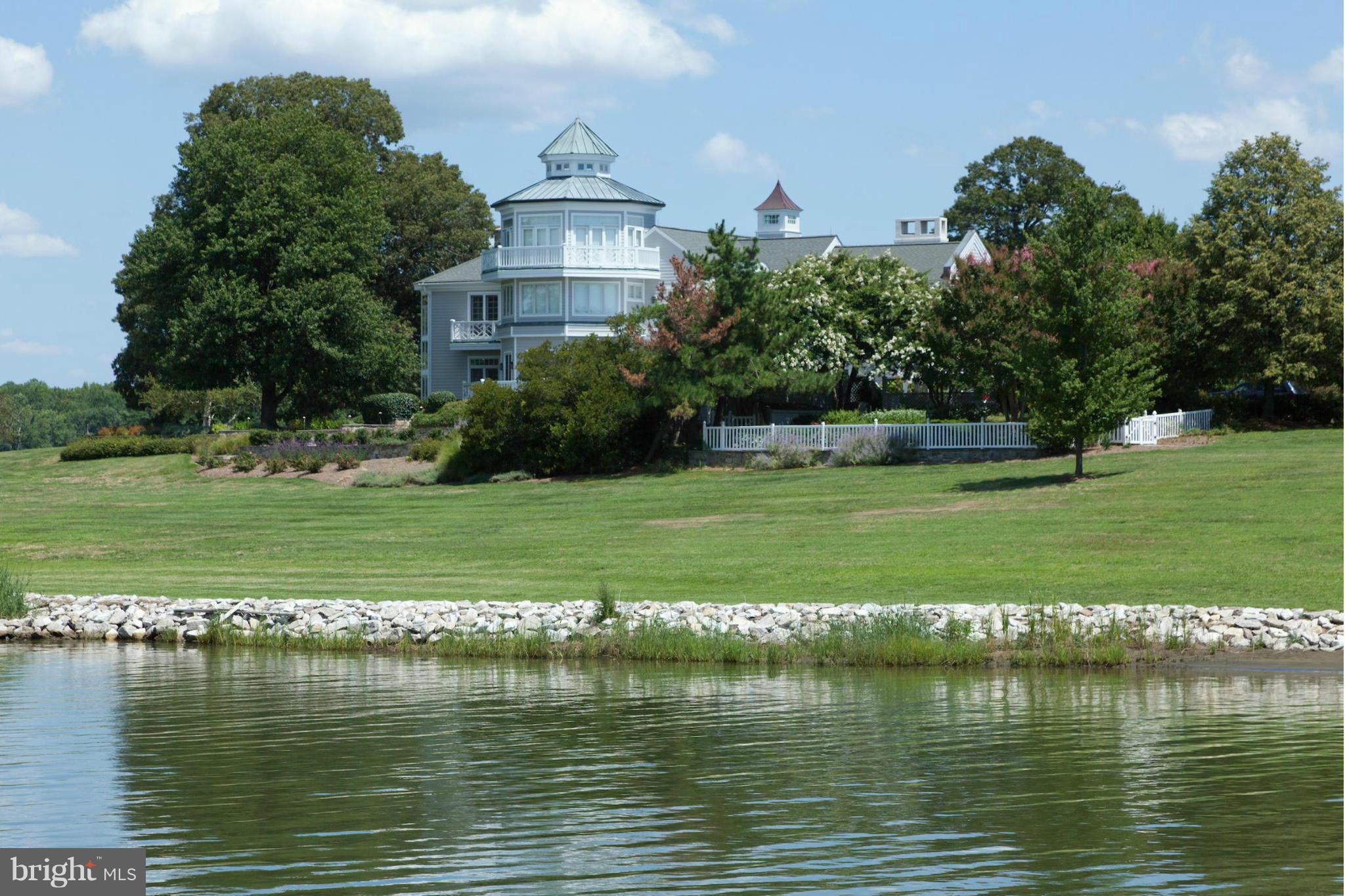 1234 Cherry Tree Lane Annapolis, MD 21403 - Photo 25 of 29 a view of a lake with a building in the background
