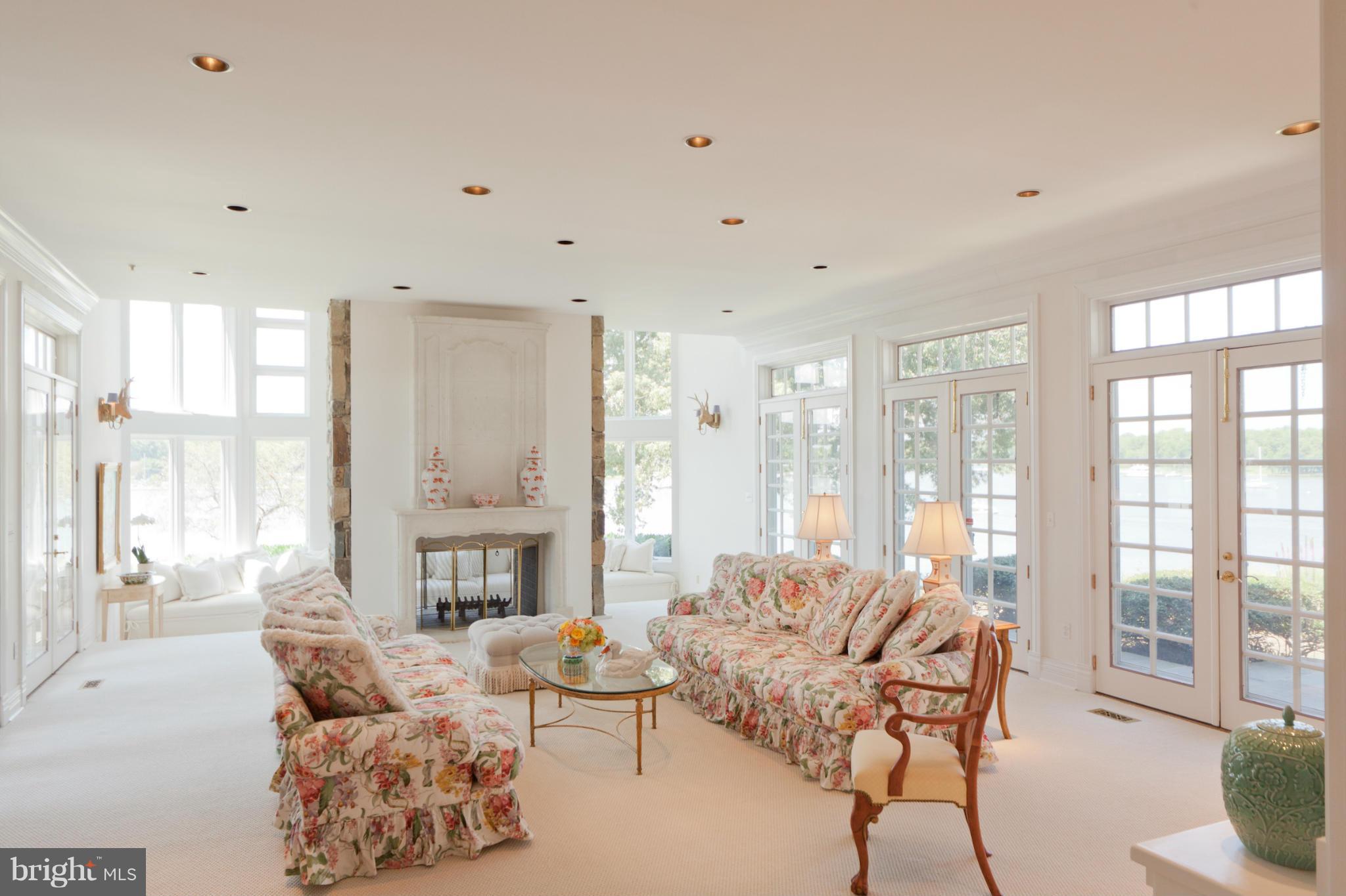 1234 Cherry Tree Lane Annapolis, MD 21403 - Photo 6 of 29 a living room with furniture fireplace and a large window