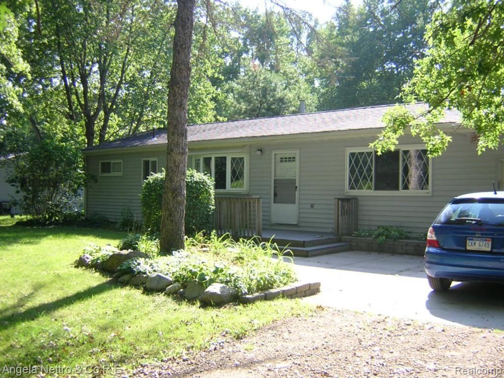 19700 Karr Road Belleville, MI 48111 - Photo 17 of 23 SIDE VIEW WITH FRONT TREES