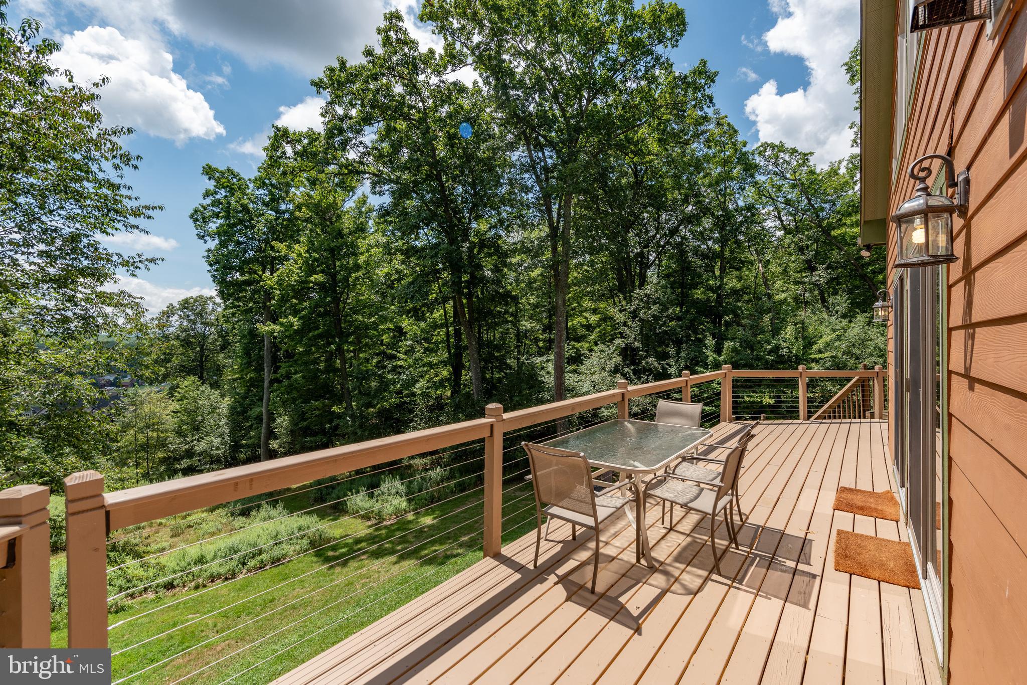 2828 Glendale Road Swanton, MD 21561 - Photo 58 of 78 a view of balcony with wooden floor and fence
