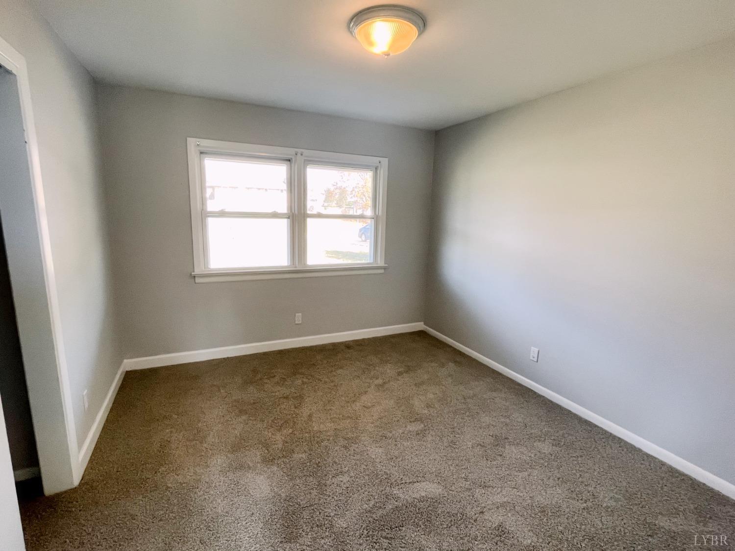 288 Lynbrook Road Rustburg, VA 24588 - Photo 13 of 34 an empty room with a window