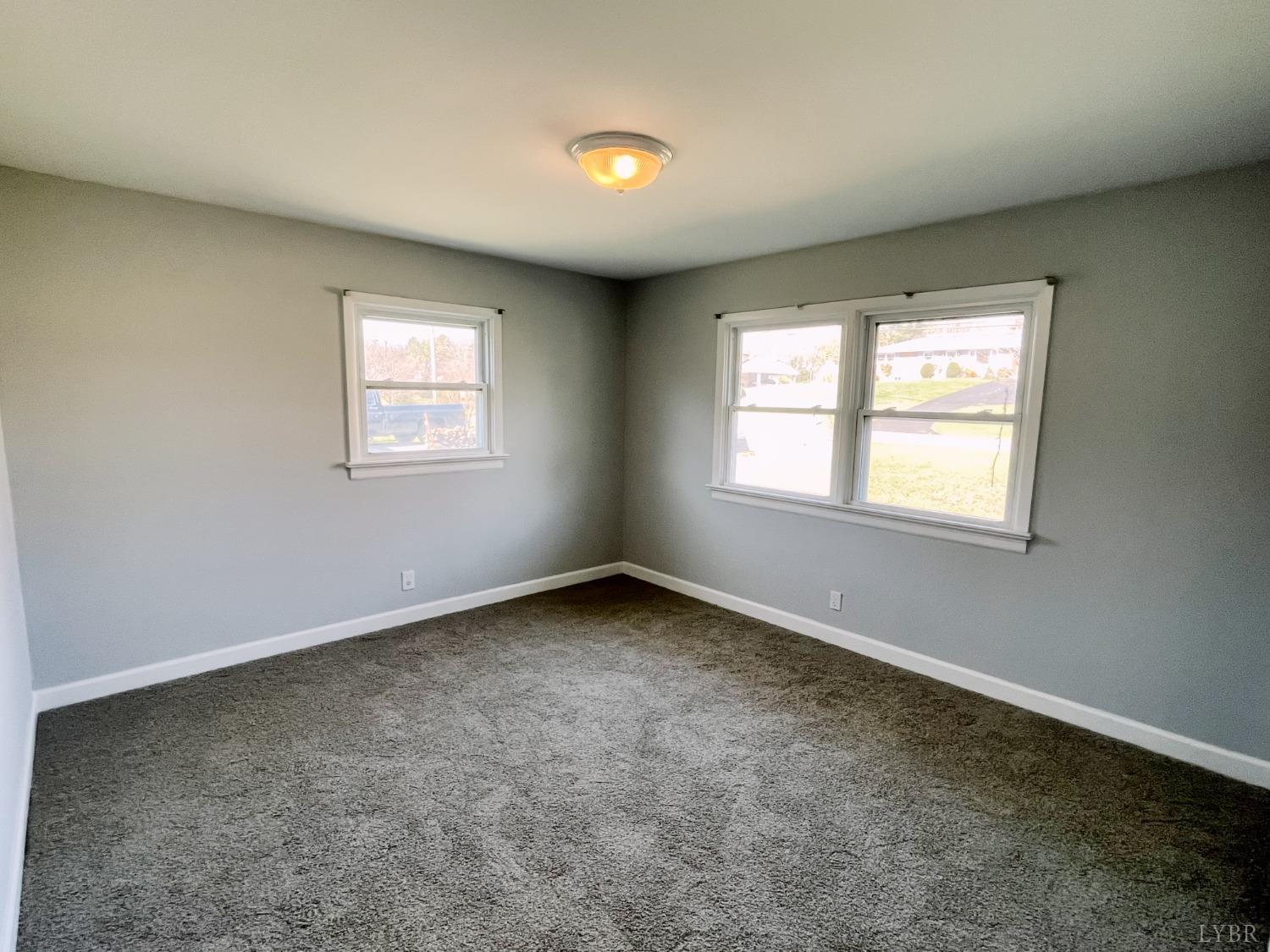 288 Lynbrook Road Rustburg, VA 24588 - Photo 14 of 34 an empty room with windows
