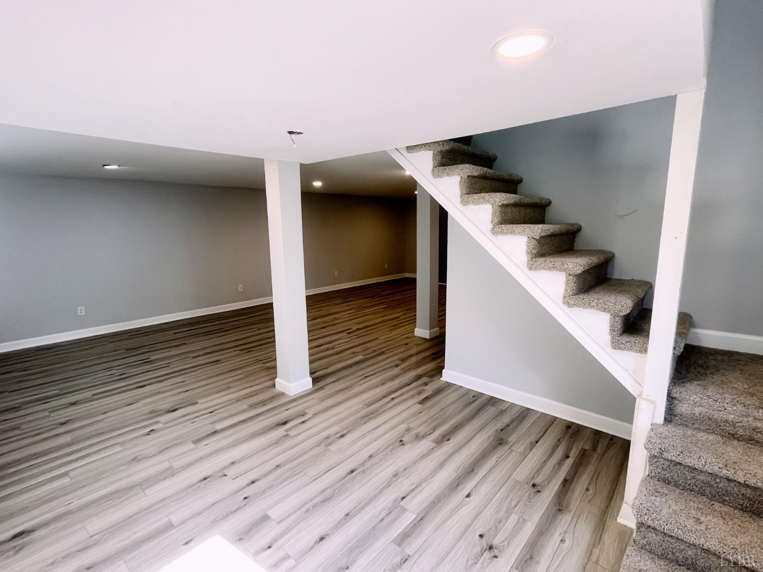 288 Lynbrook Road Rustburg, VA 24588 - Photo 17 of 34 a view of entryway and kitchen with wooden floor