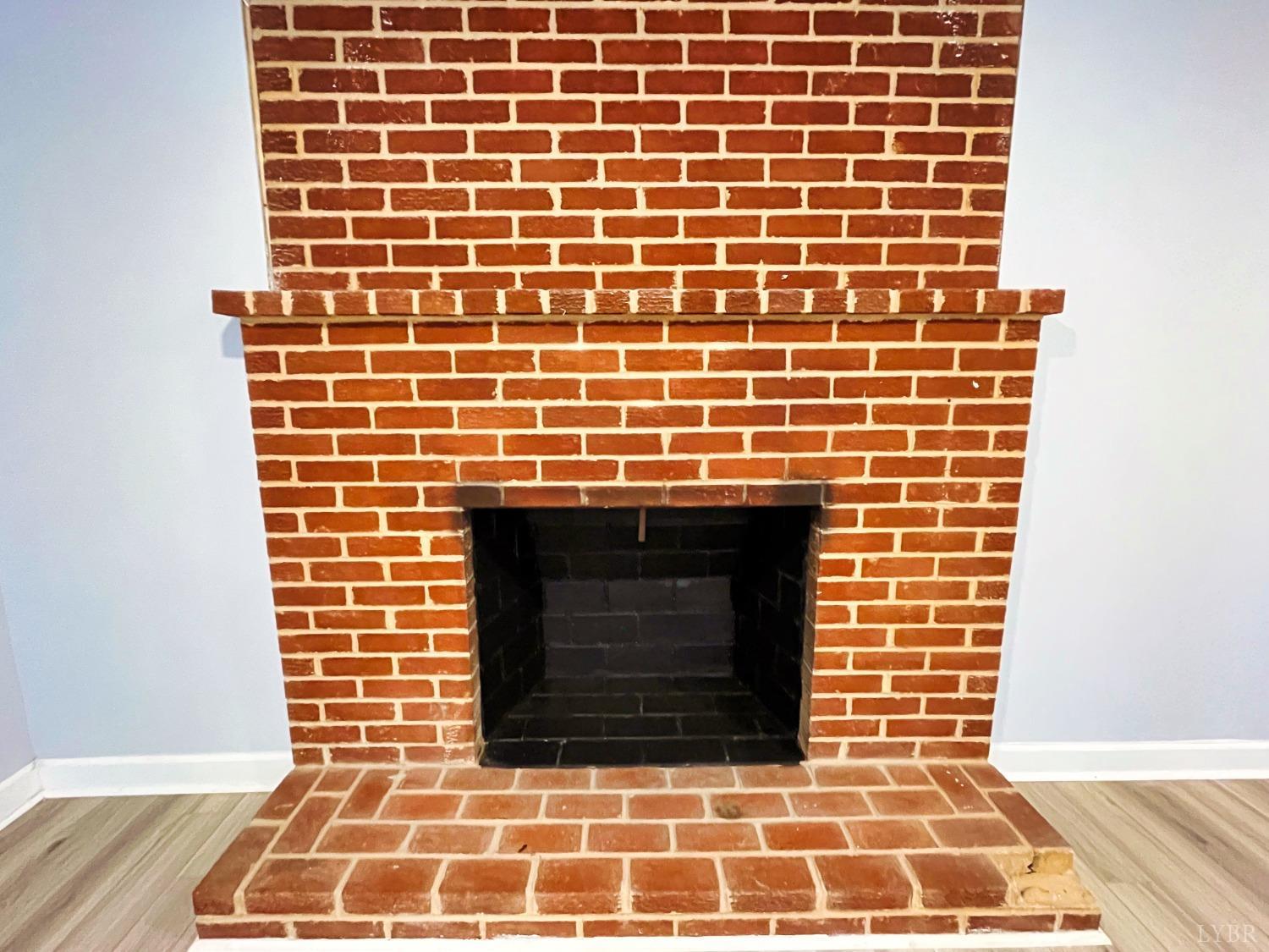 288 Lynbrook Road Rustburg, VA 24588 - Photo 19 of 34 a brick oven with a fireplace