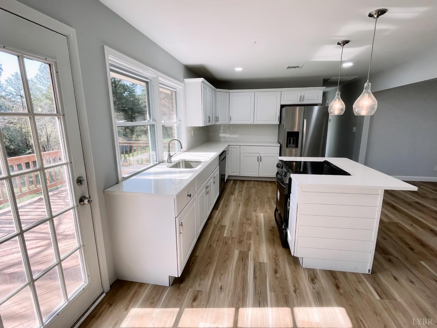 288 Lynbrook Road Rustburg, VA 24588 - Photo 7 of 34 a kitchen with refrigerator and window