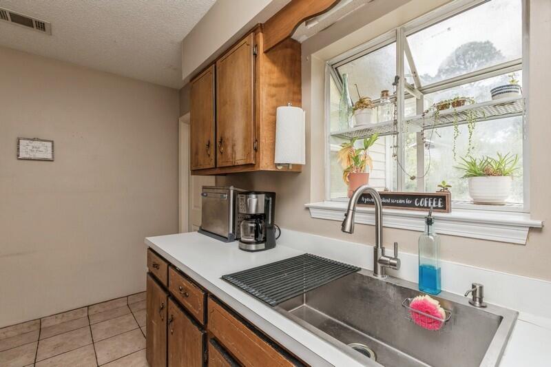 422 John King Road Crestview, FL 32539 - Photo 12 of 30 a kitchen with sink and window