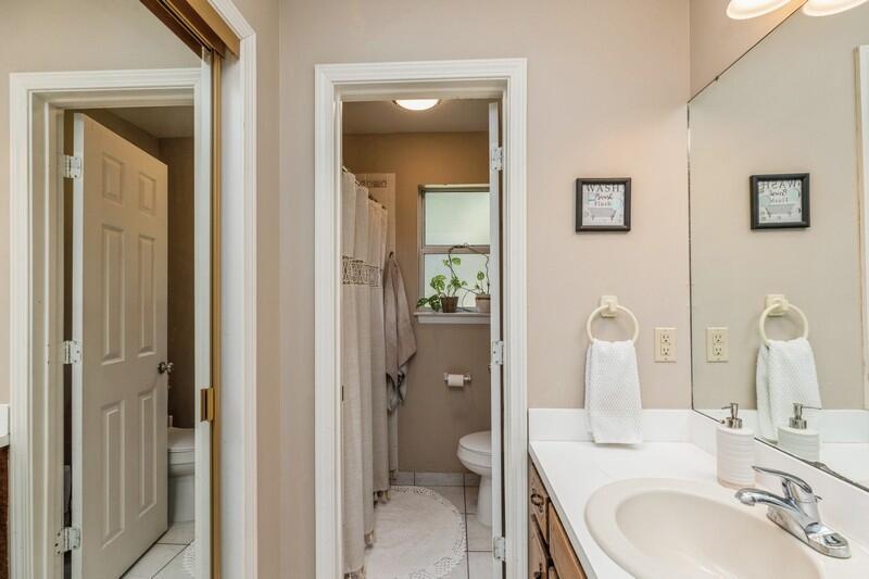 422 John King Road Crestview, FL 32539 - Photo 24 of 30 a bath room with a sink and a mirror
