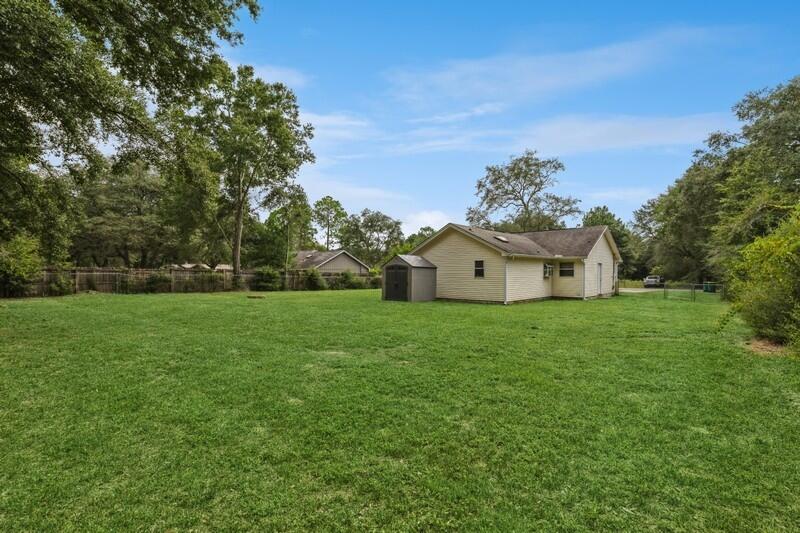 422 John King Road Crestview, FL 32539 - Photo 28 of 30 a house view with a garden space