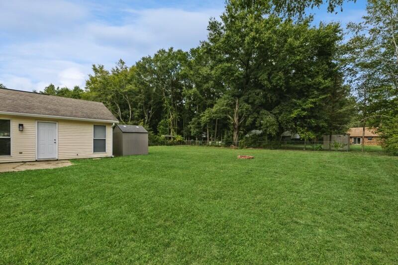 422 John King Road Crestview, FL 32539 - Photo 30 of 30 a view of a backyard with large trees