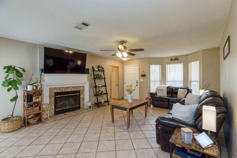 422 John King Road Crestview, FL 32539 - Photo 6 of 30 a living room with furniture and a fireplace