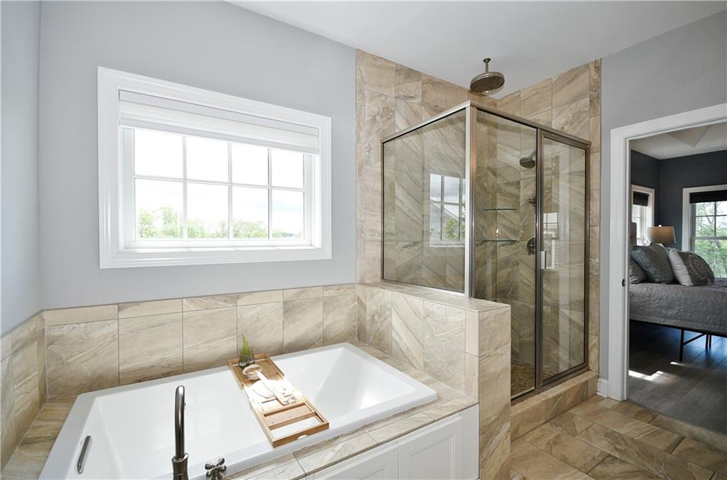 239 Venango Trail Mars, PA 16046 - Photo 23 of 39 a bathroom with a tub shower and sink