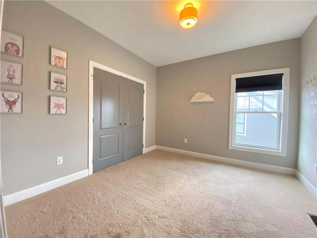239 Venango Trail Mars, PA 16046 - Photo 26 of 39 an empty room with windows and closet