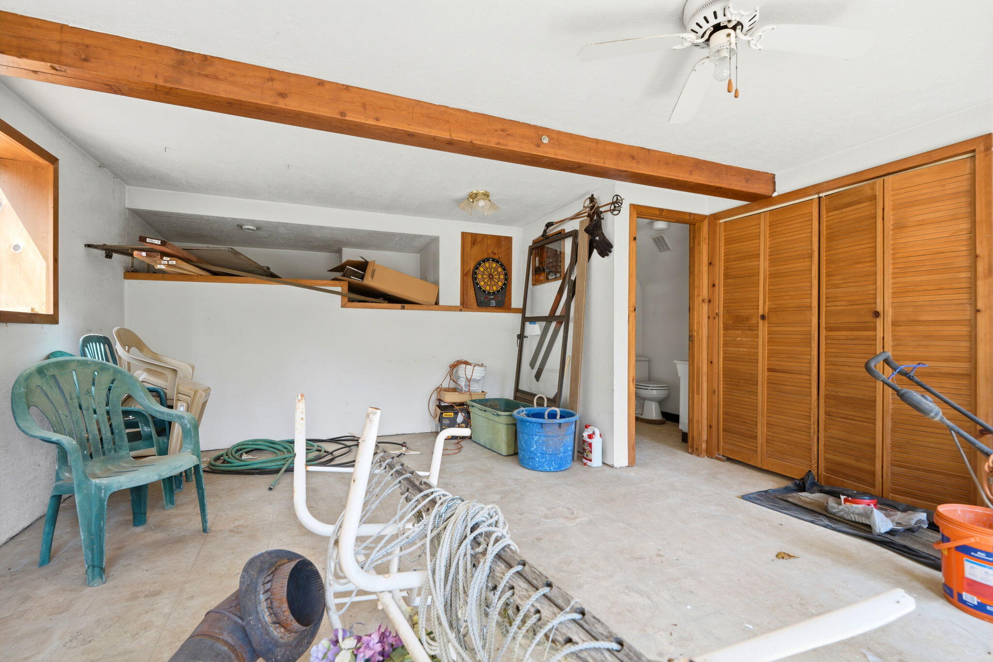 697 Loop Drive Springville, CA 93265 - Photo 38 of 55 a bedroom with furniture and a window