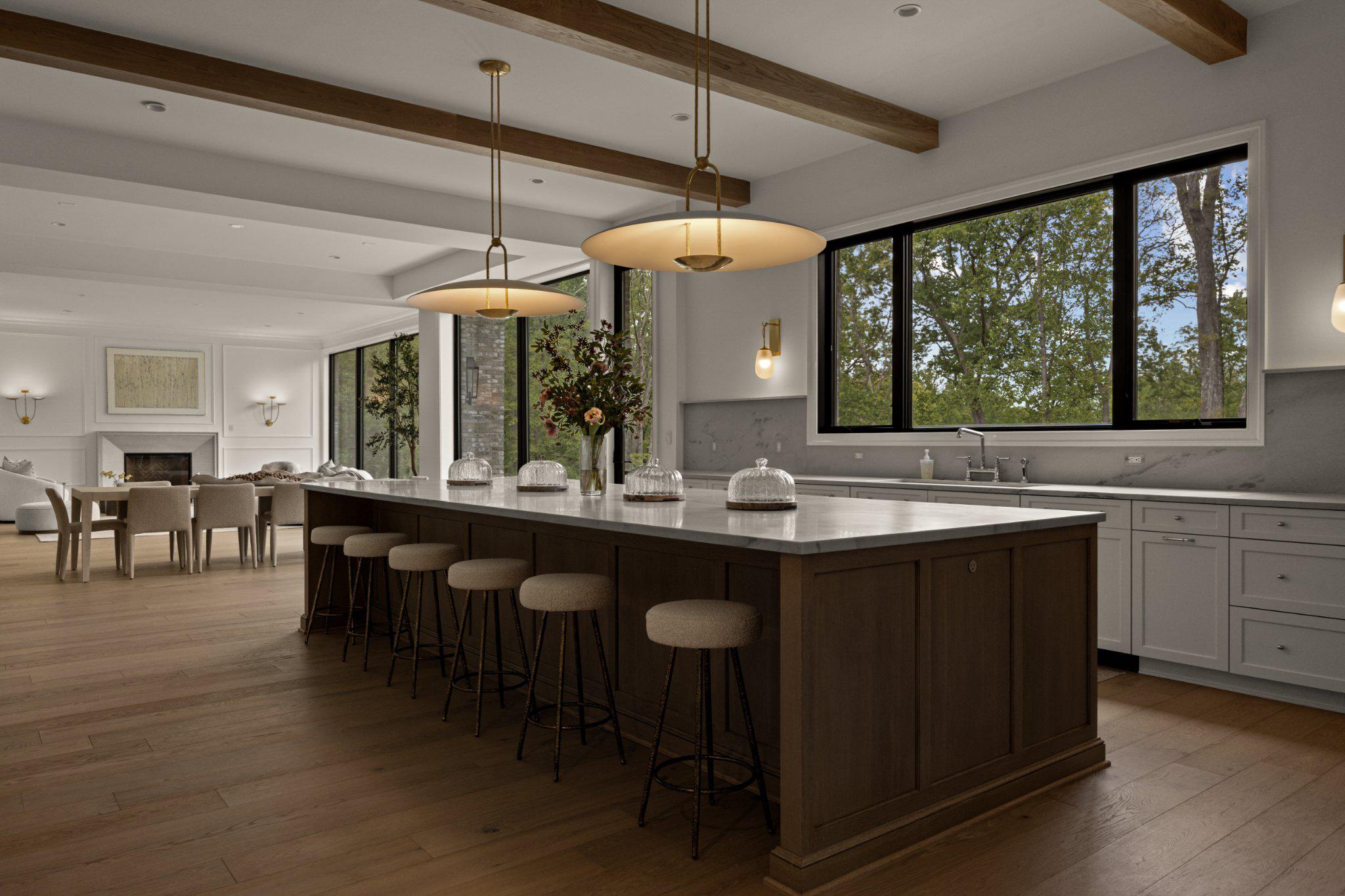 8634 Overlook Road McLean, VA 22102 - Photo 22 of 88 a kitchen with center island with sink and a large window