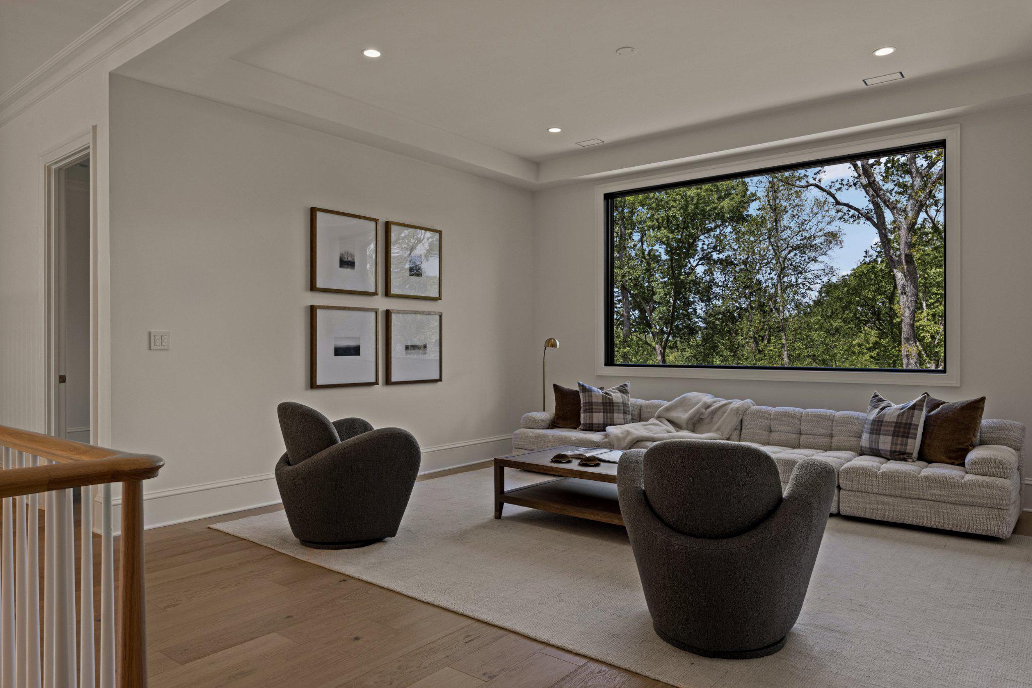 8634 Overlook Road McLean, VA 22102 - Photo 36 of 88 a living room with furniture and a large window