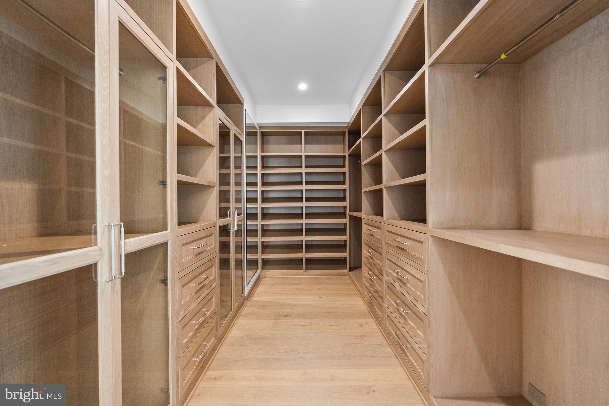 8634 Overlook Road McLean, VA 22102 - Photo 55 of 88 a view of walk in closet with empty racks