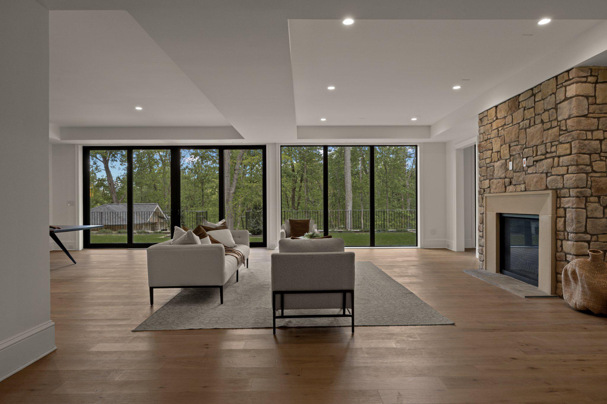 8634 Overlook Road McLean, VA 22102 - Photo 65 of 88 a living room with furniture and a fireplace