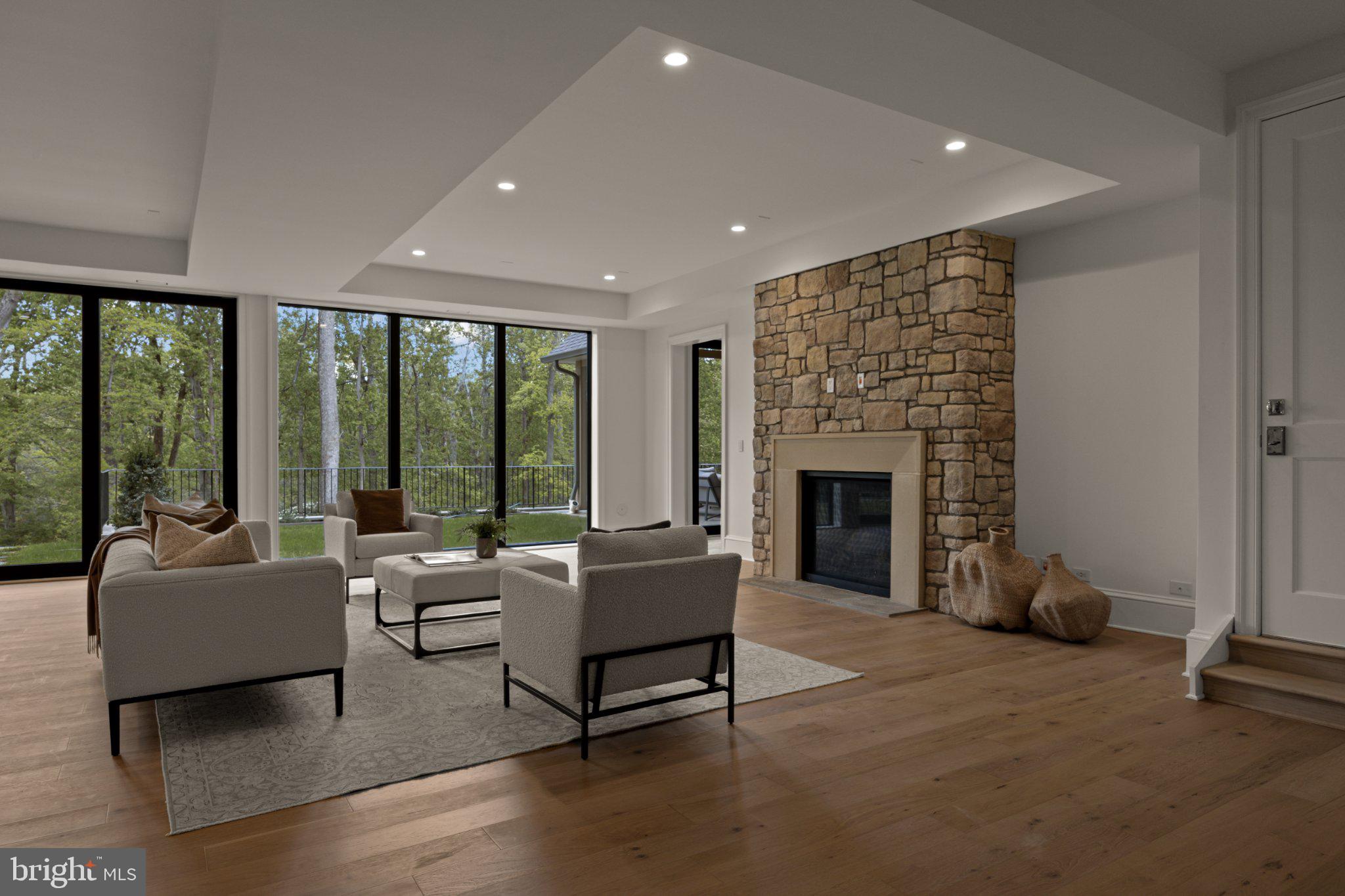 8634 Overlook Road McLean, VA 22102 - Photo 66 of 88 a living room with furniture and a fireplace