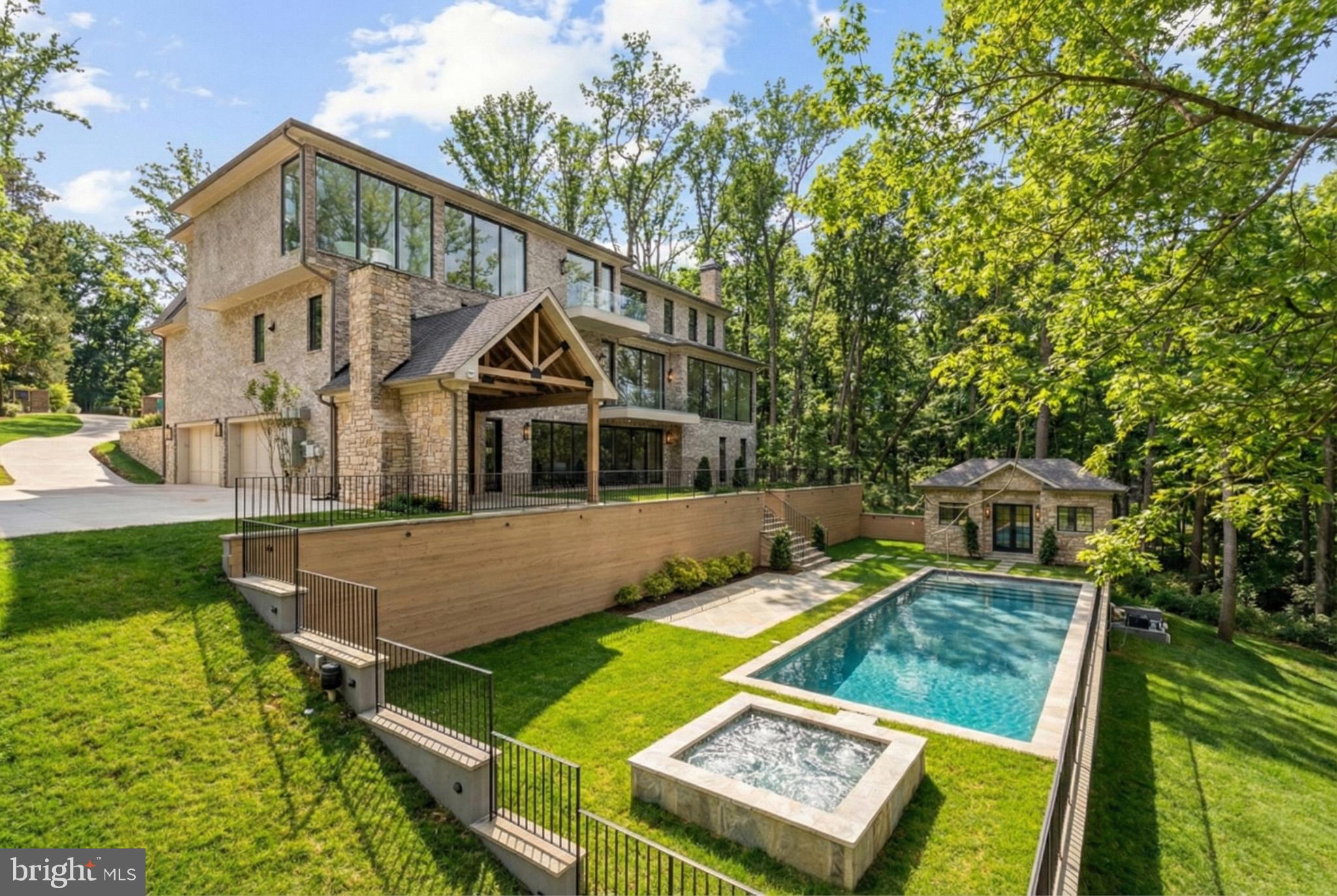 8634 Overlook Road McLean, VA 22102 - Photo 77 of 88 aerial view of a house with swimming pool