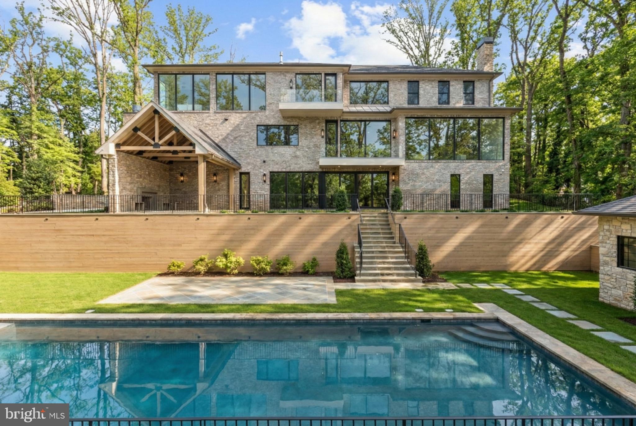 8634 Overlook Road McLean, VA 22102 - Photo 78 of 88 a front view of a house with a yard
