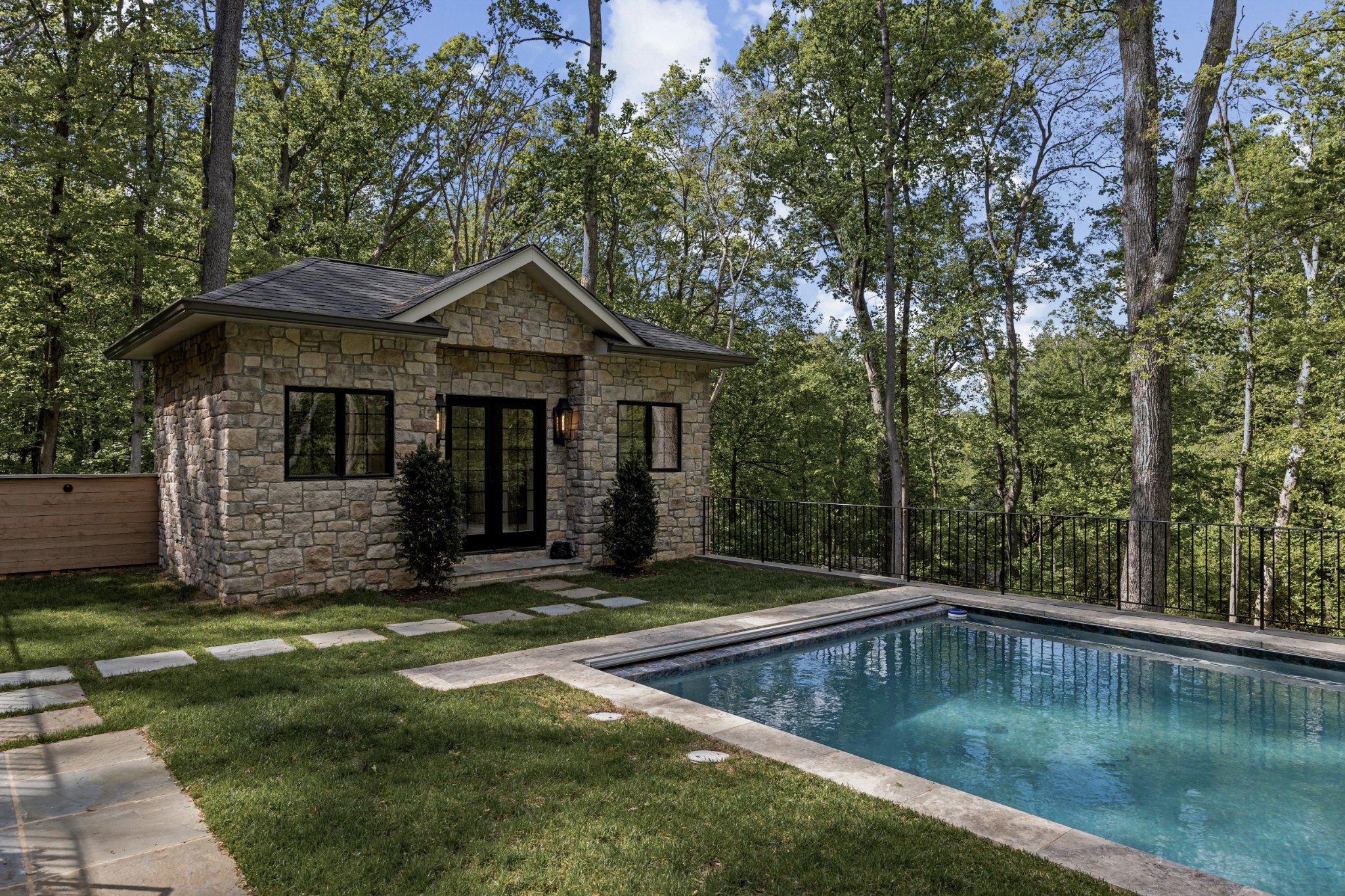 8634 Overlook Road McLean, VA 22102 - Photo 80 of 88 a view of a house with swimming pool next to a yard