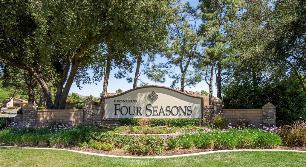 256 4 Seasons Boulevard Hemet, CA 92545 - Photo 22 of 31 a sign on the side of a building