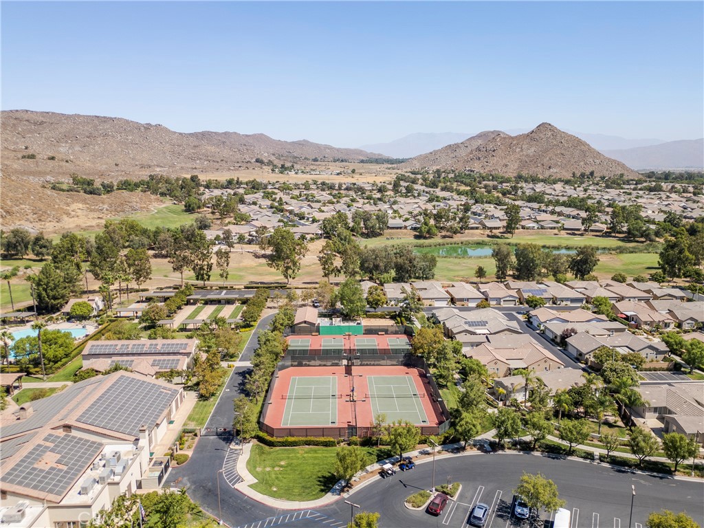256 4 Seasons Boulevard Hemet, CA 92545 - Photo 27 of 31 an aerial view of residential houses and lake view