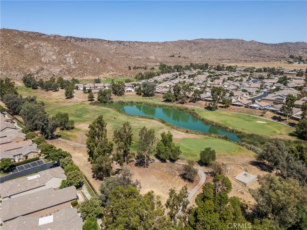 256 4 Seasons Boulevard Hemet, CA 92545 - Photo 30 of 31 an aerial view of residential houses with outdoor space and river