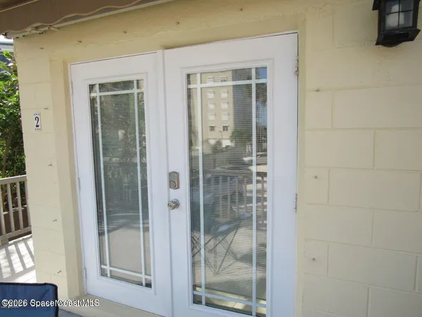 a view of living room kitchen