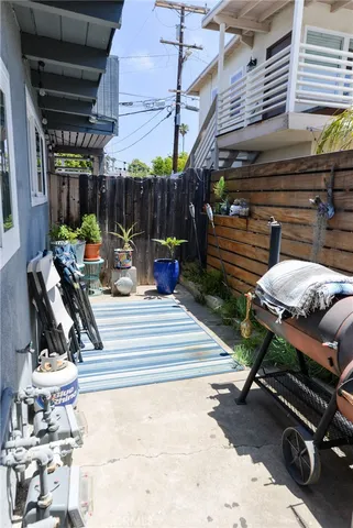 a view of a chairs and table in a patio