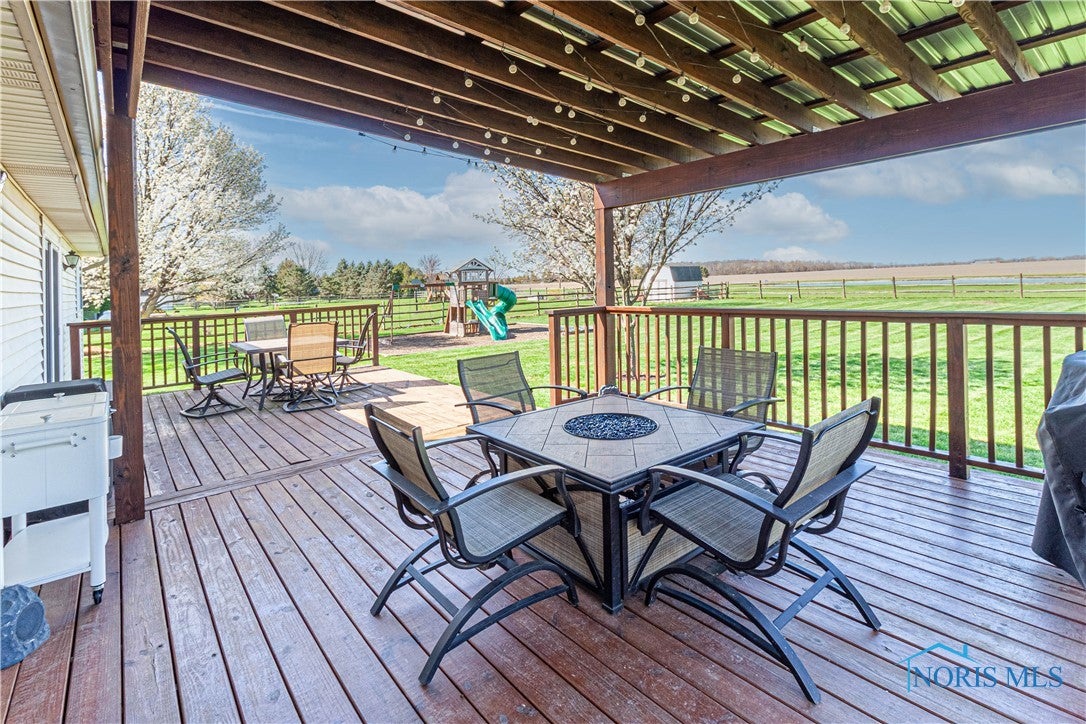 556 South Lathrop Road Swanton, OH 43558 - Photo 31 of 45 Enjoy a meal under your beautiful covered deck on these gorgeous spring and summer evenings!