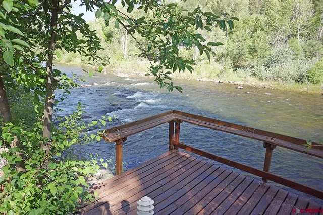 a view of a backyard with a sitting area