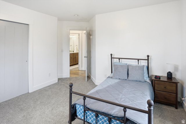 1009 High Creek Road Cove, UT 84320 - Photo 43 of 79 Bedroom with carpet flooring and baseboards