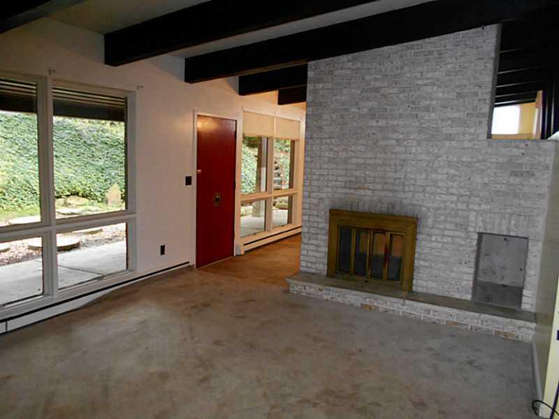 741 McCoy Road McKees Rocks, PA 15136 - Photo 5 of 15 Living Room. LARGE LIVING ROOM LOOKS OUT ONTO PRIVATE PATIO & BACKYARD
