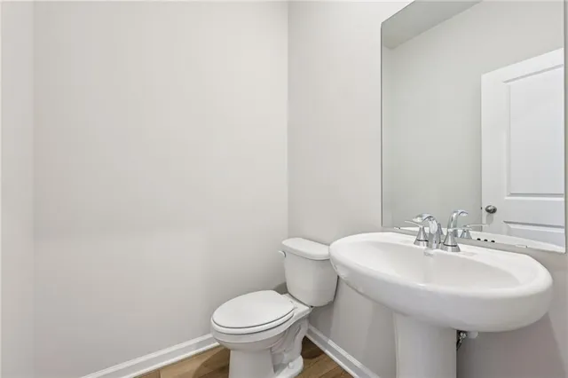 a bathroom with a sink and a toilet