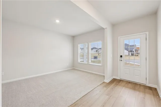 an empty room with windows