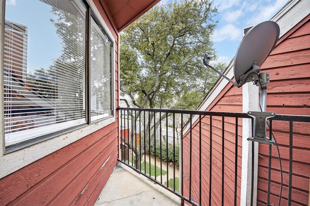 9825 Walnut Street, Unit 306 Dallas, TX 75243 - Photo 16 of 23 a view of balcony with wooden floor