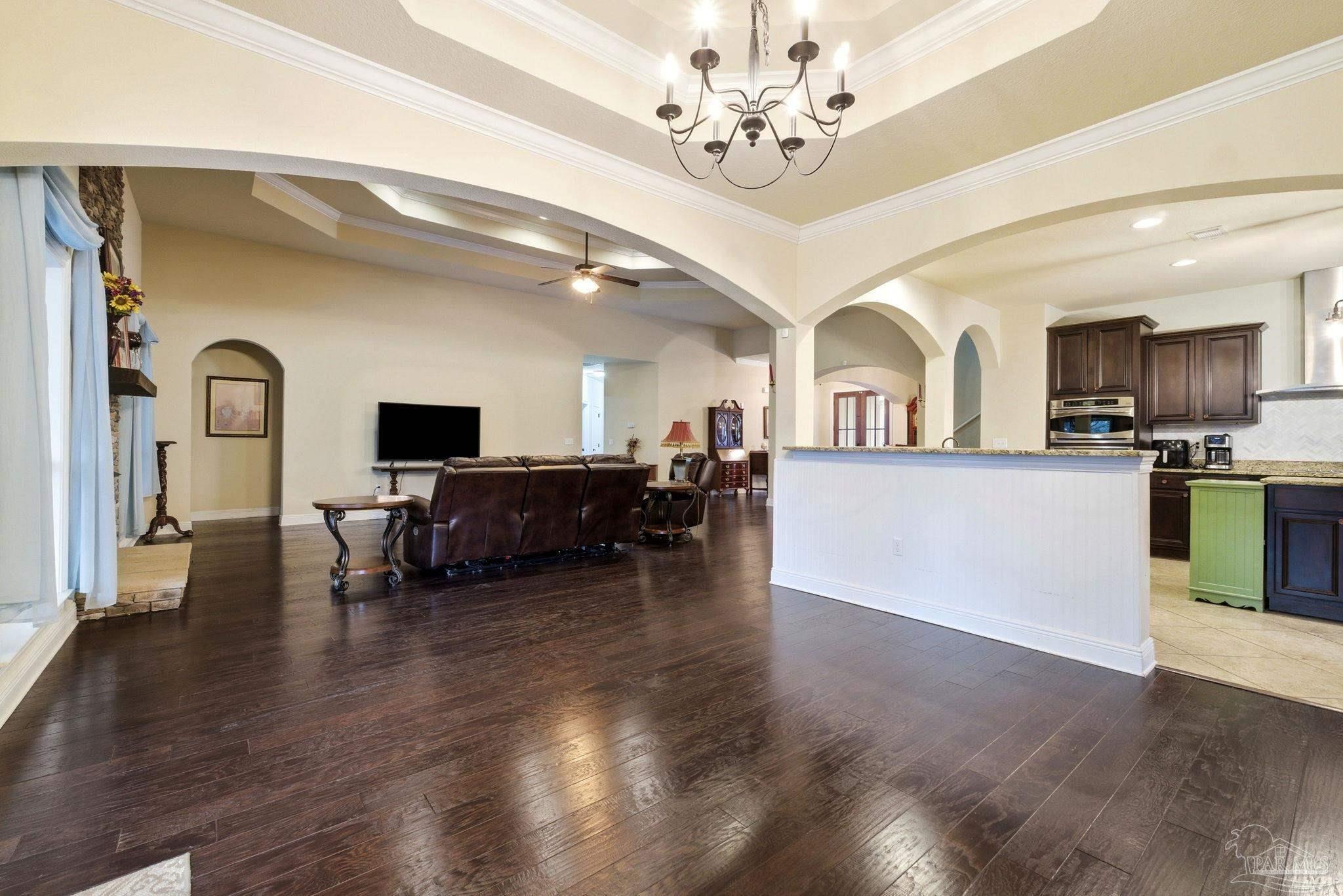 1207 Wings Way Cantonment, FL 32533 - Photo 15 of 39 a view of a kitchen with sink microwave and cabinets