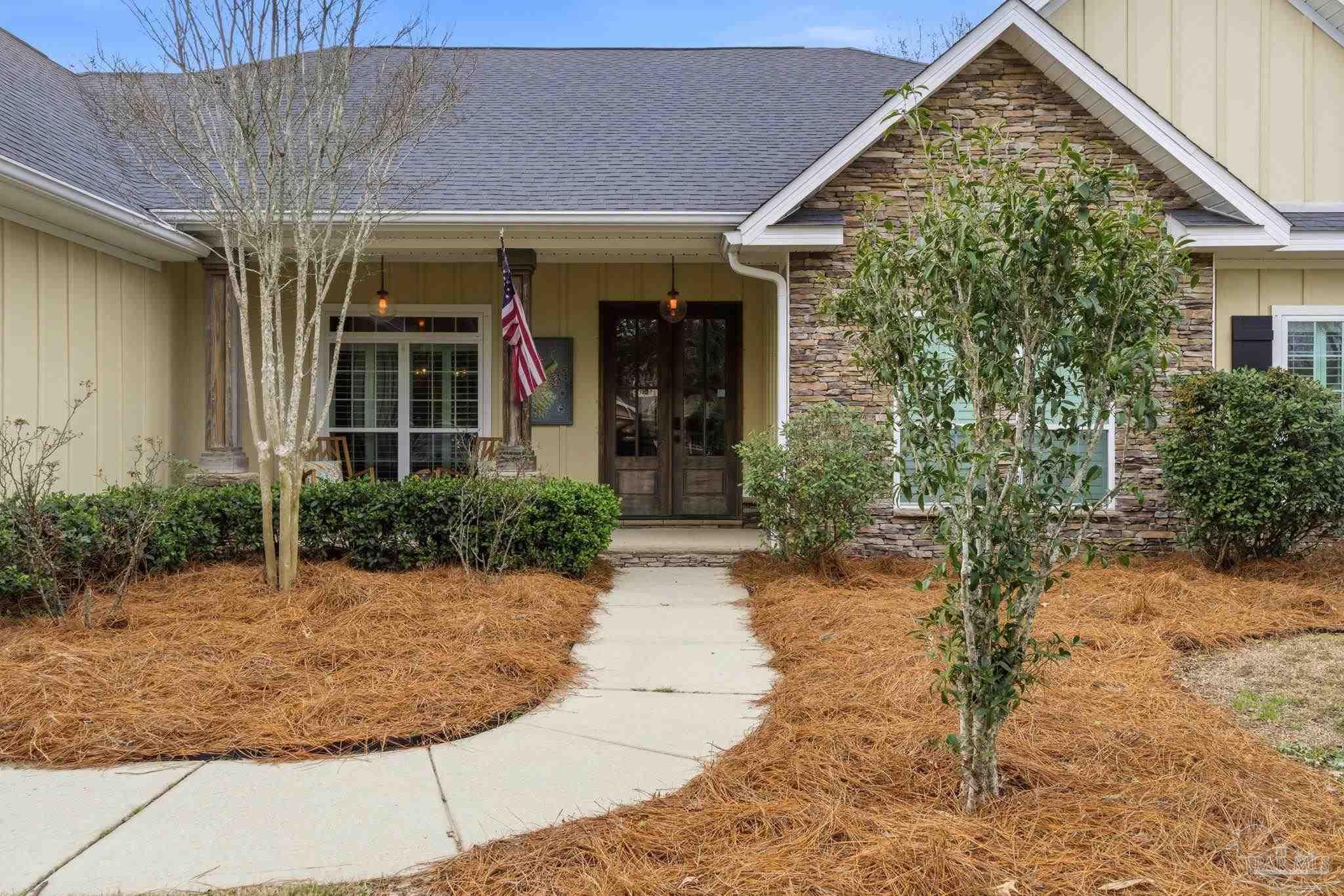 1207 Wings Way Cantonment, FL 32533 - Photo 4 of 39 front view of a house