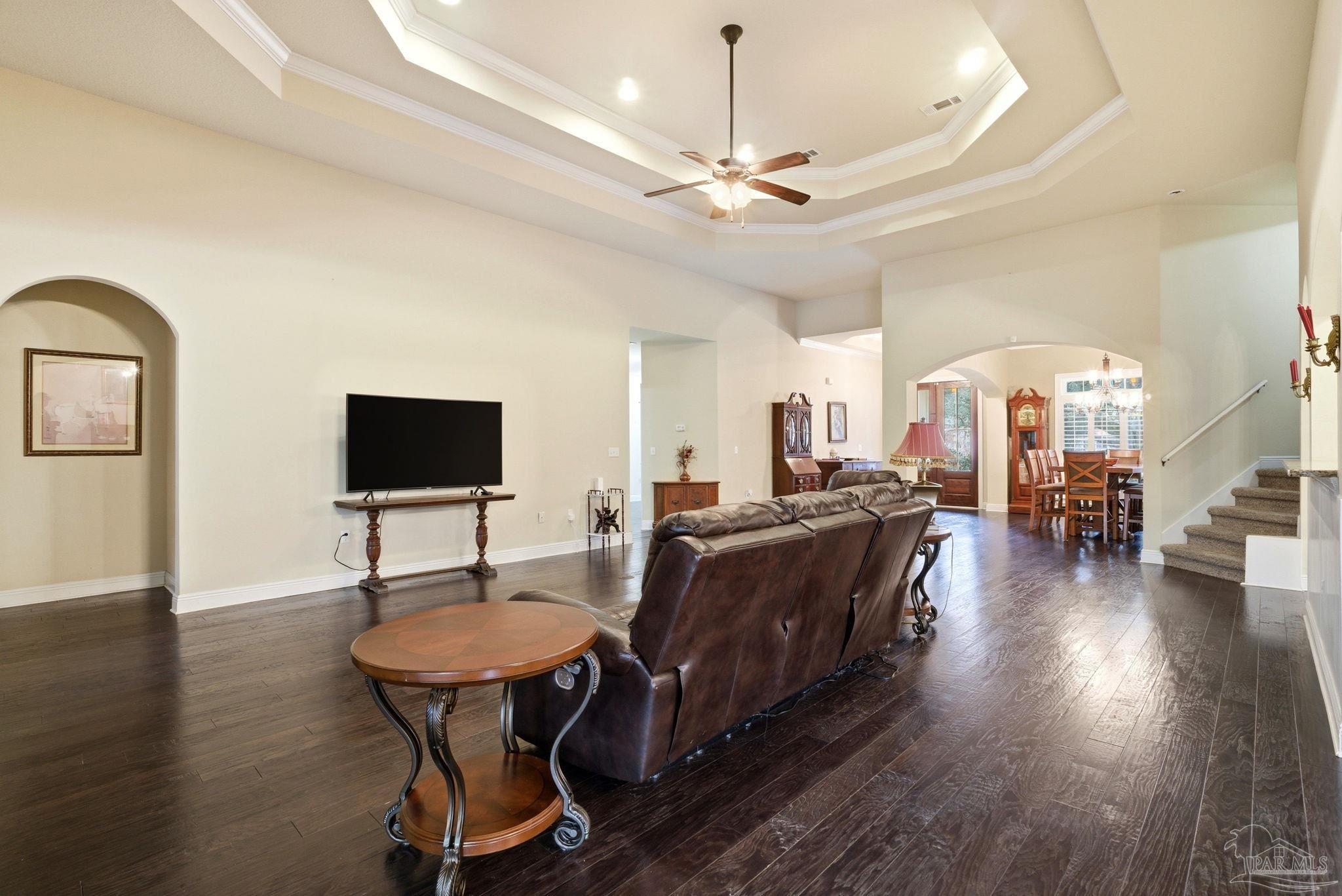 1207 Wings Way Cantonment, FL 32533 - Photo 10 of 39 a living room with furniture and a flat screen tv